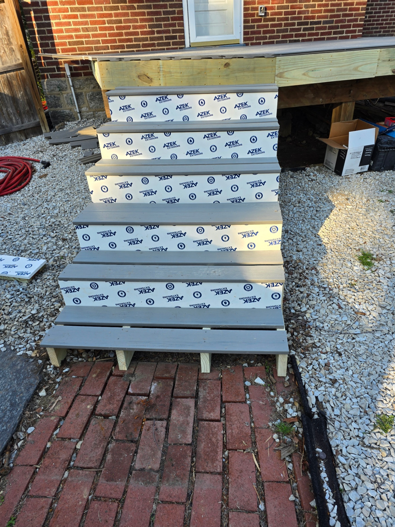 New AZEK composite deck stairs during installation