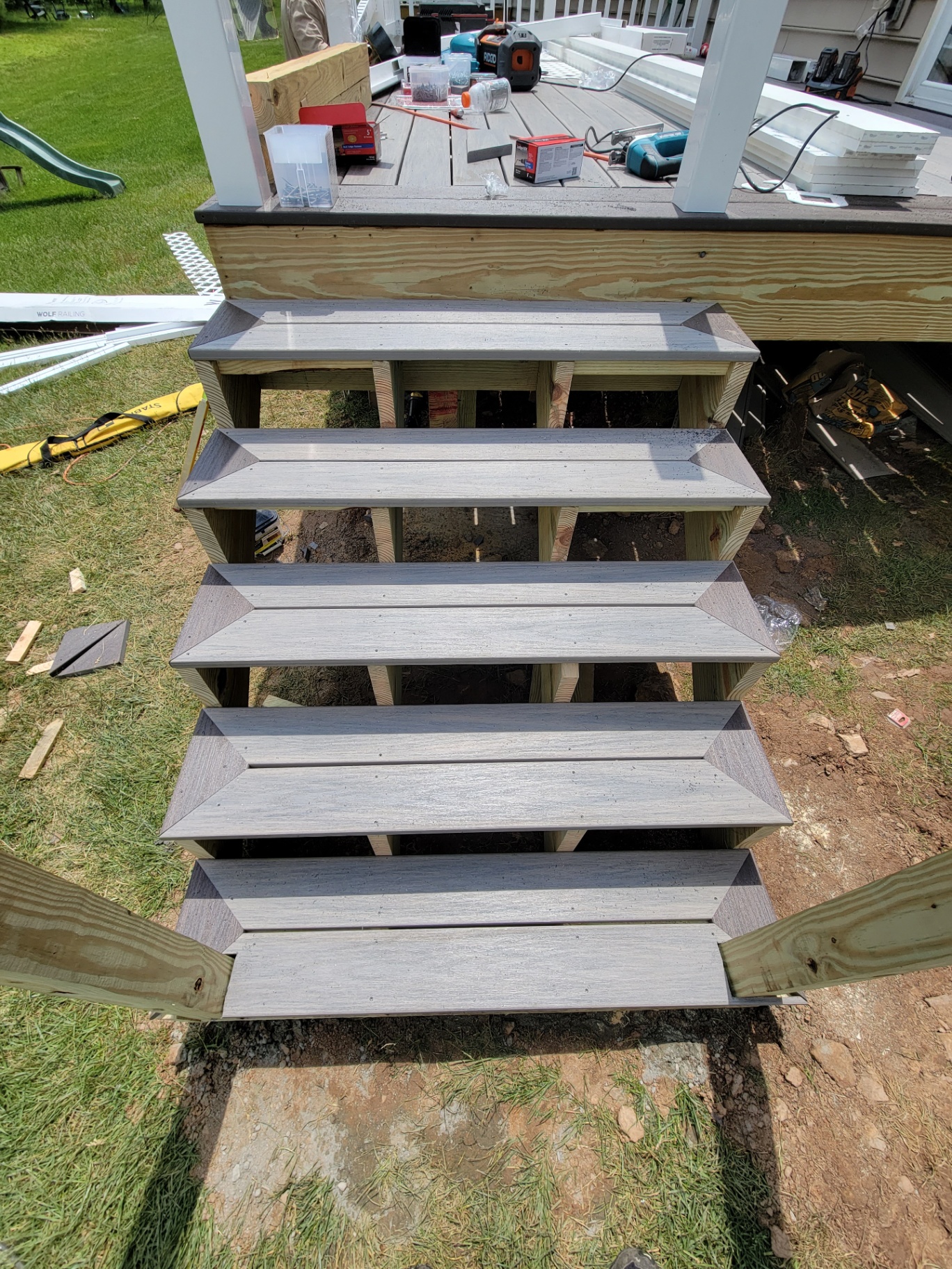 Composite deck stairs with picture-frame treads